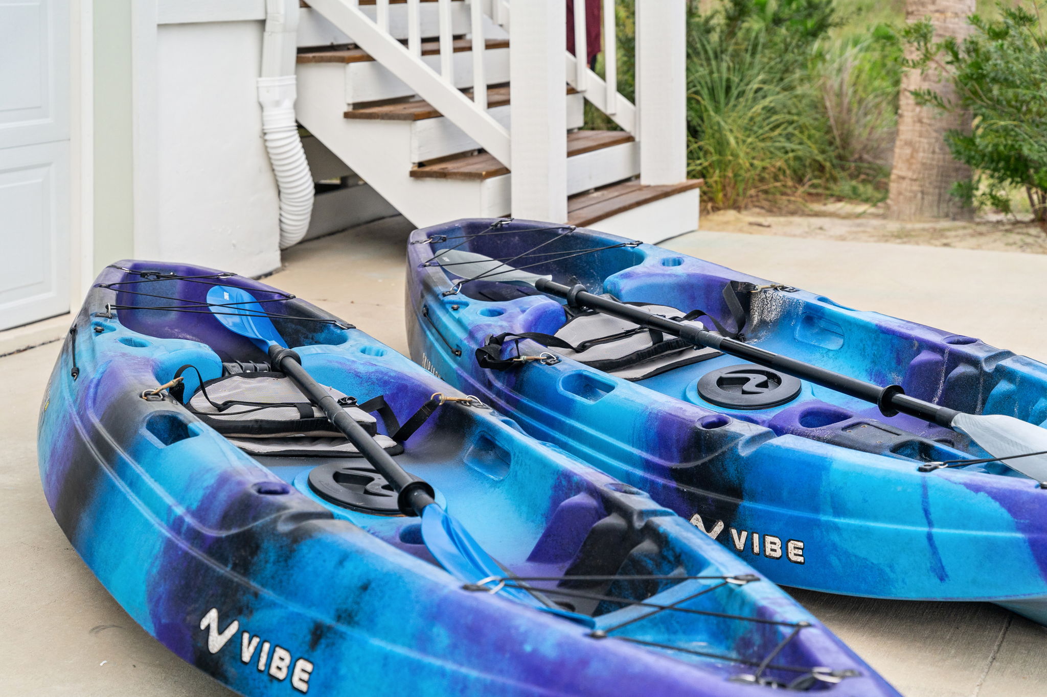 Two kayaks ready for bay adventures